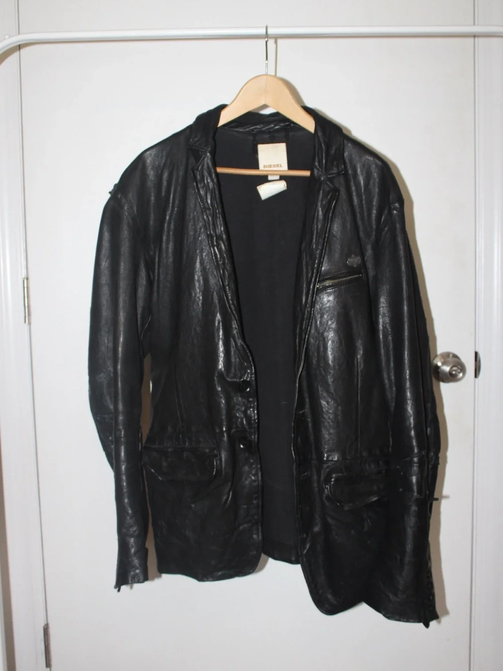 VINTAGE thrifted Diesel Men's Black Distressed Leather Jacket